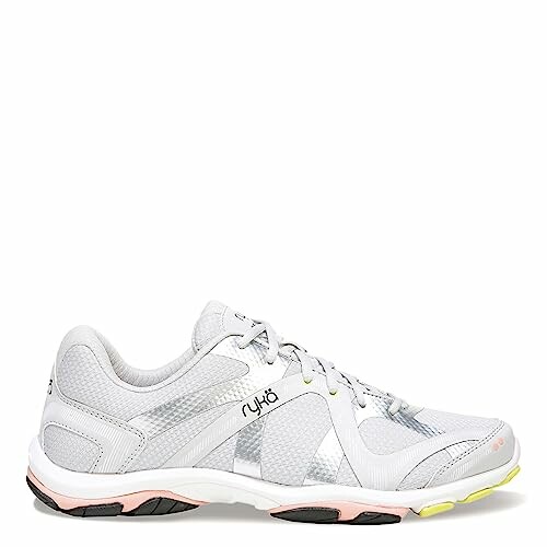 White athletic shoe with gray accents and pink and yellow sole